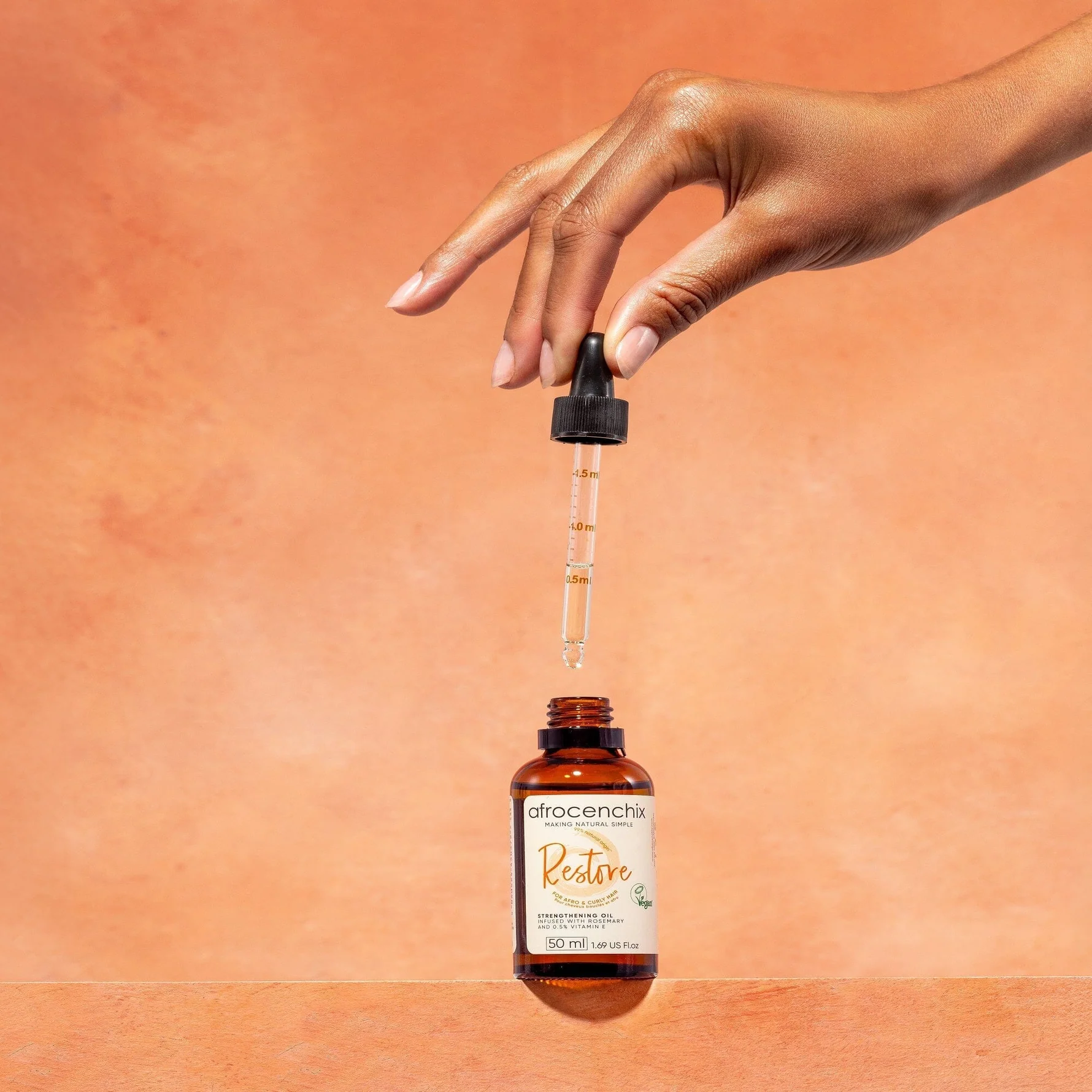 Afrocenchix Strengthening Biotin Oil - Image 5
